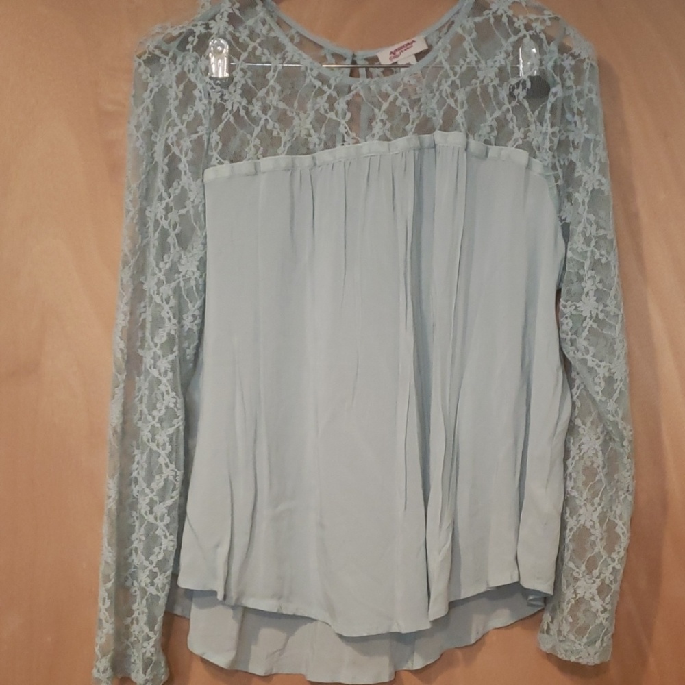 Slightly sheer lace detail blouse